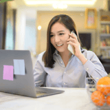 business woman working with her computer home