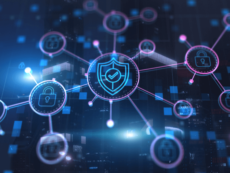 Cybersecurity network concept with a central shield icon and interconnected padlock icons against a cityscape backdrop.